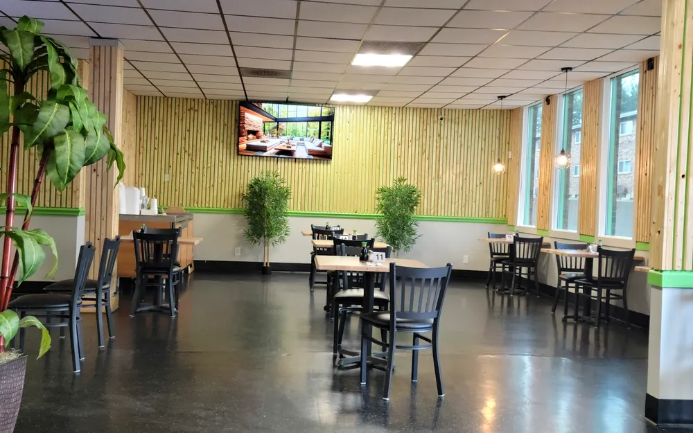 Bright, welcoming dining room inside Kasabi in Hazelwood, MO