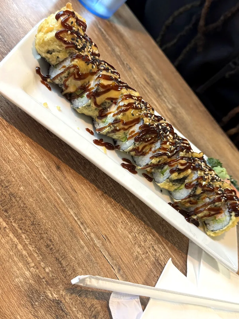 Shrimp tempura sushi roll with eel sauce at Kasabi