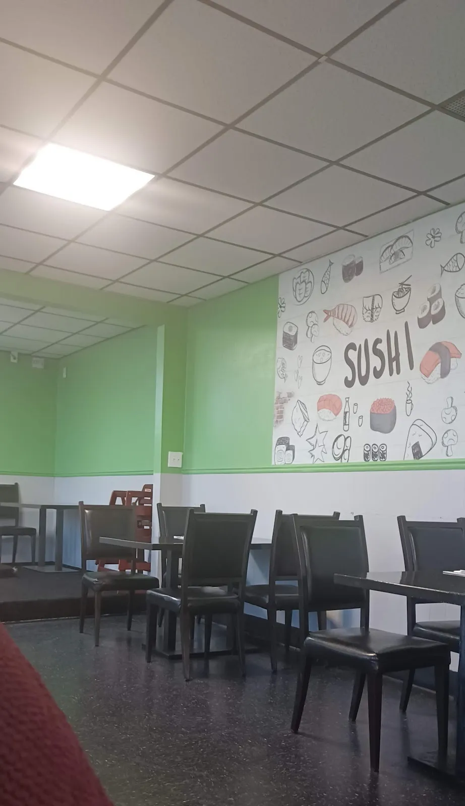 Sushi mural and booth seating inside Kasabi in Hazelwood, MO